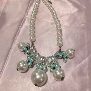 Plunder necklace and earrings set.